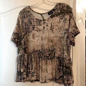 The softest material ever! Crop top. Print of pink, green, tan,and cream colors.